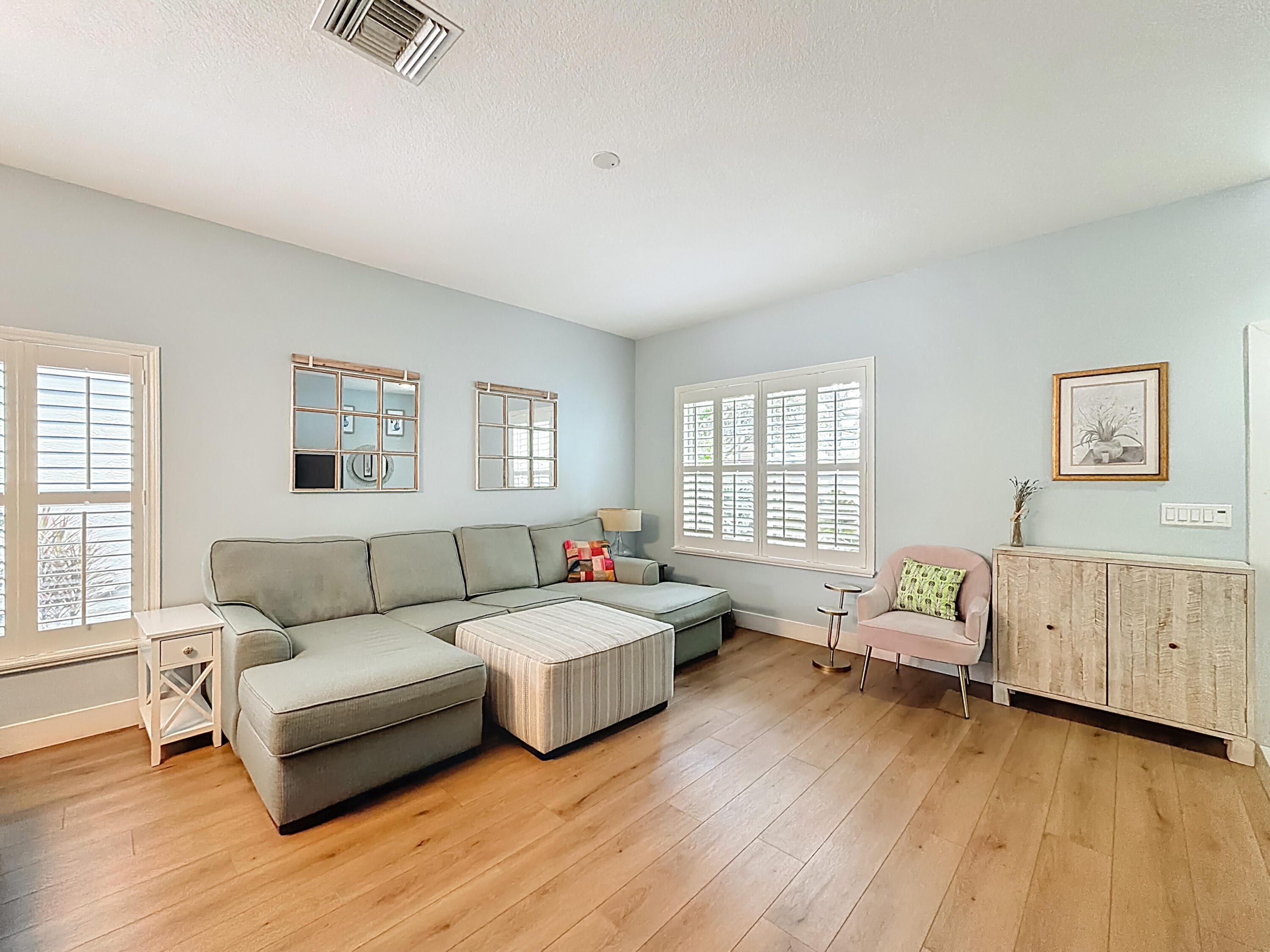 1143 Canoe Point Delray Beach, FL 33444 - Photo 12 of 85 a living room with furniture and a wooden floor