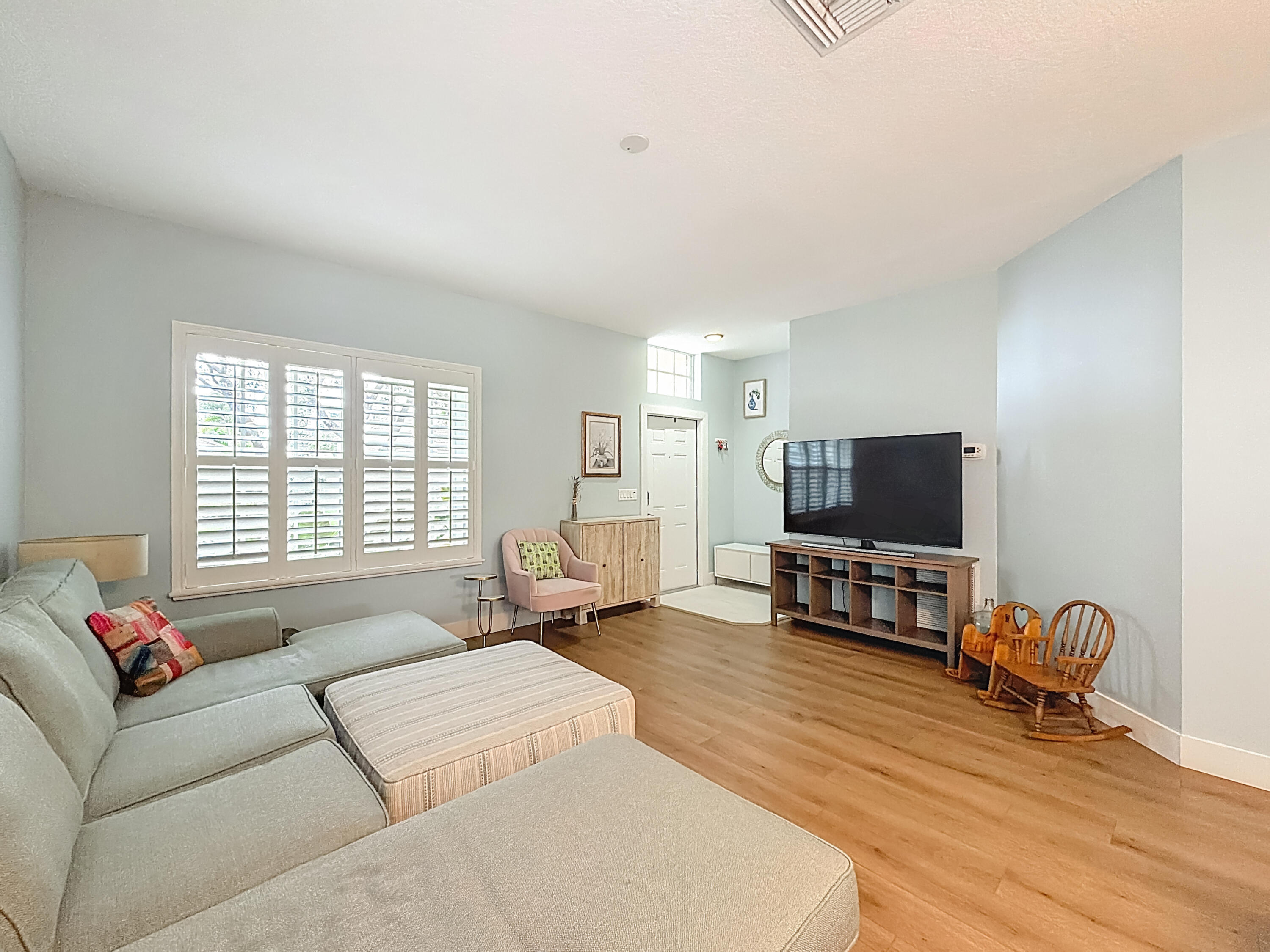 1143 Canoe Point Delray Beach, FL 33444 - Photo 13 of 85 a living room with furniture and a flat screen tv