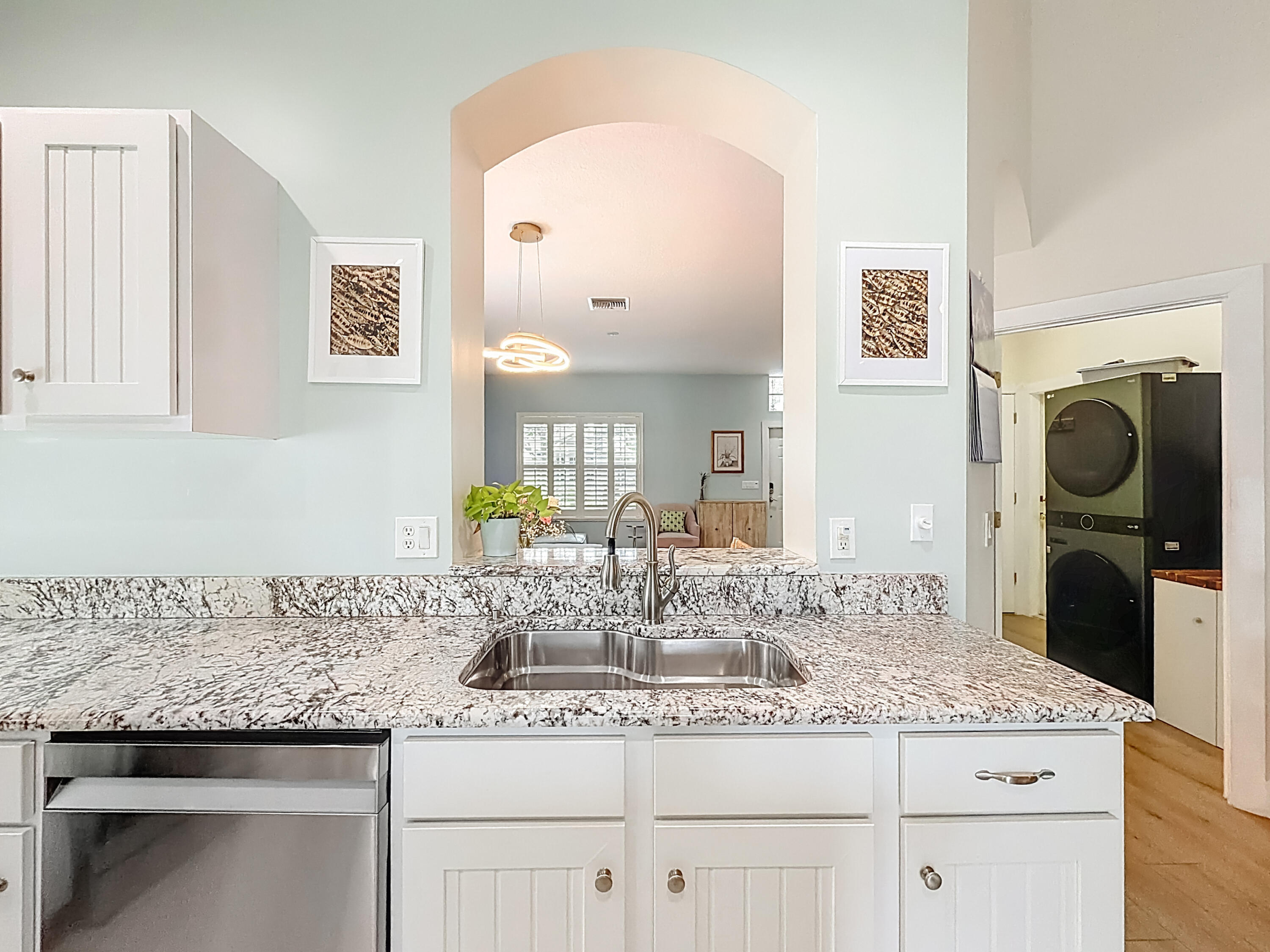 1143 Canoe Point Delray Beach, FL 33444 - Photo 23 of 85 a bathroom with a granite countertop sink and a mirror