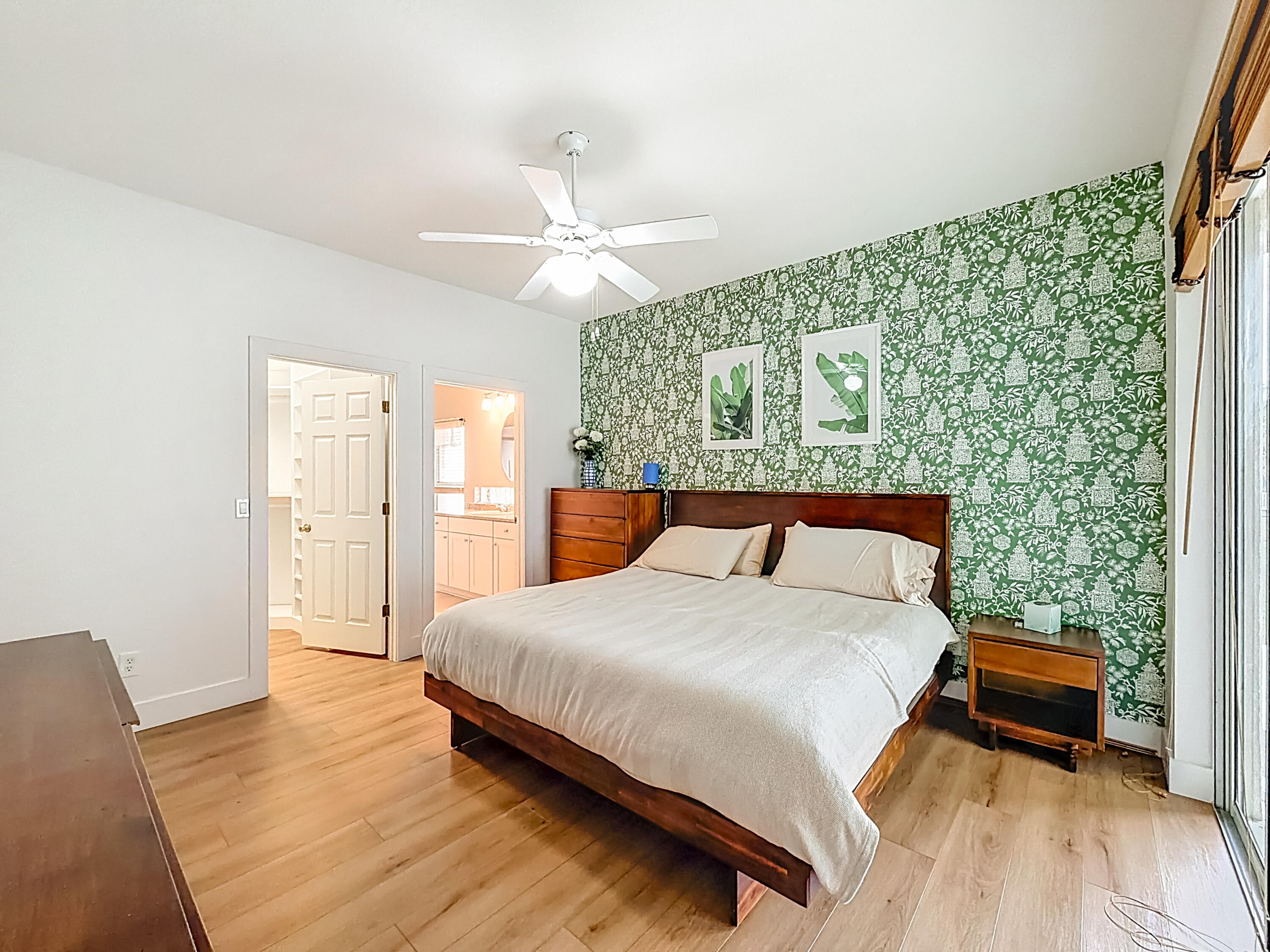 1143 Canoe Point Delray Beach, FL 33444 - Photo 32 of 85 a bedroom with a bed and a chandelier