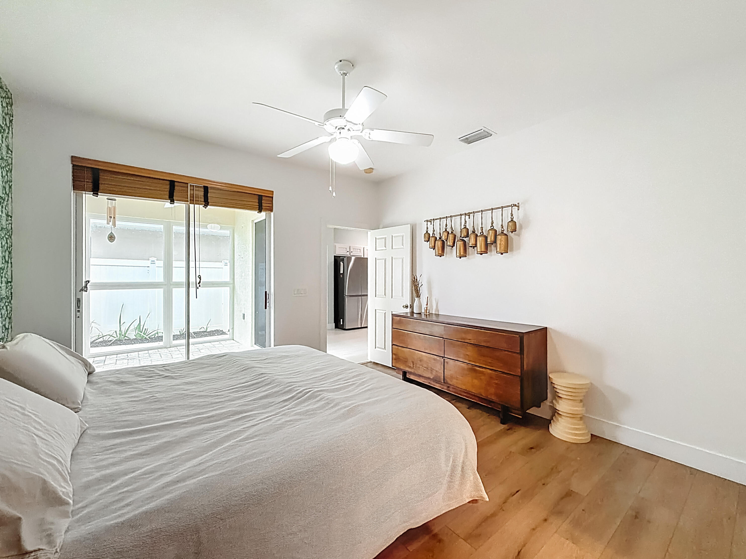 1143 Canoe Point Delray Beach, FL 33444 - Photo 39 of 85 a bedroom with a bed and a large window