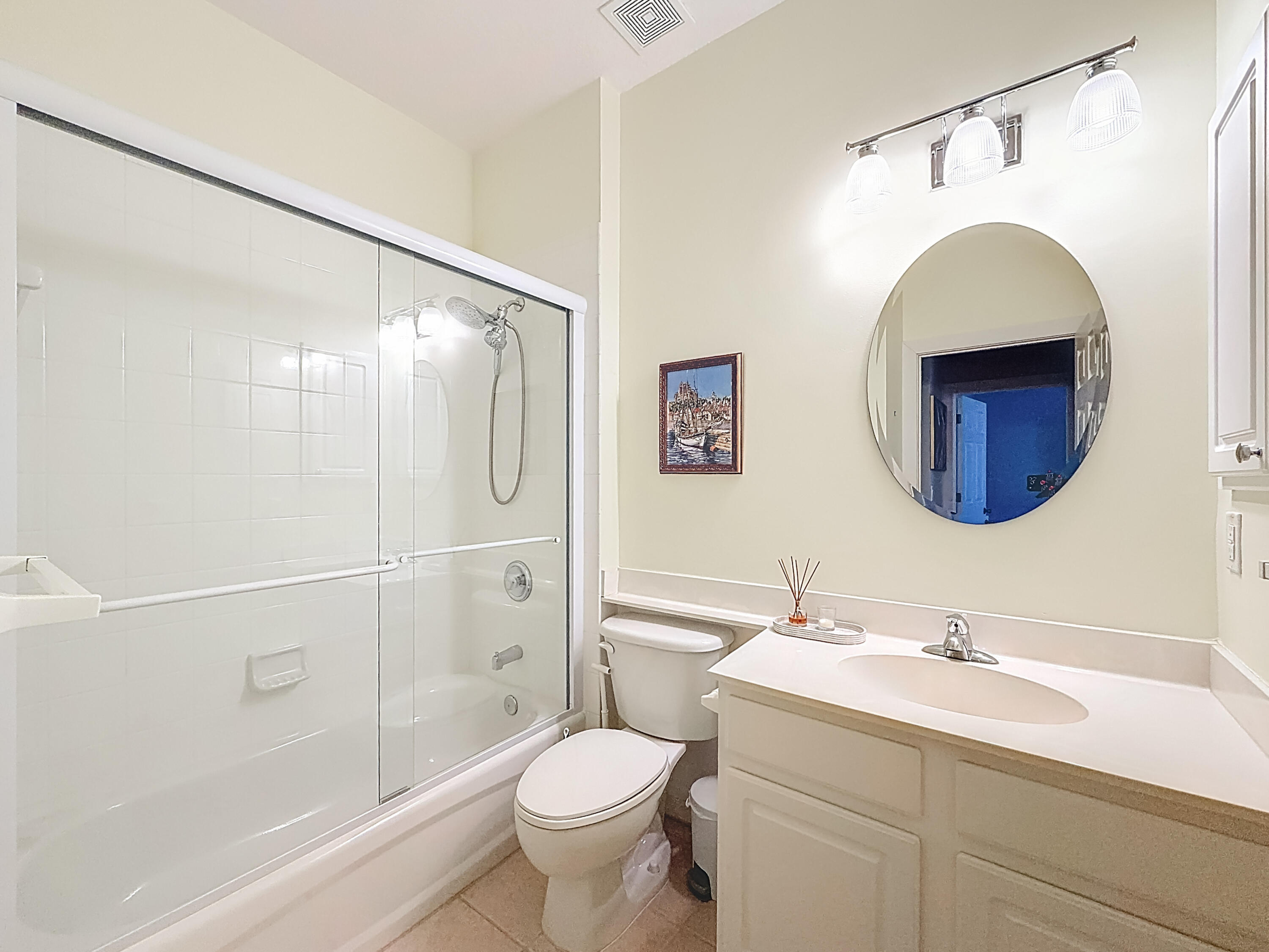 1143 Canoe Point Delray Beach, FL 33444 - Photo 47 of 85 a bathroom with a sink a toilet and shower