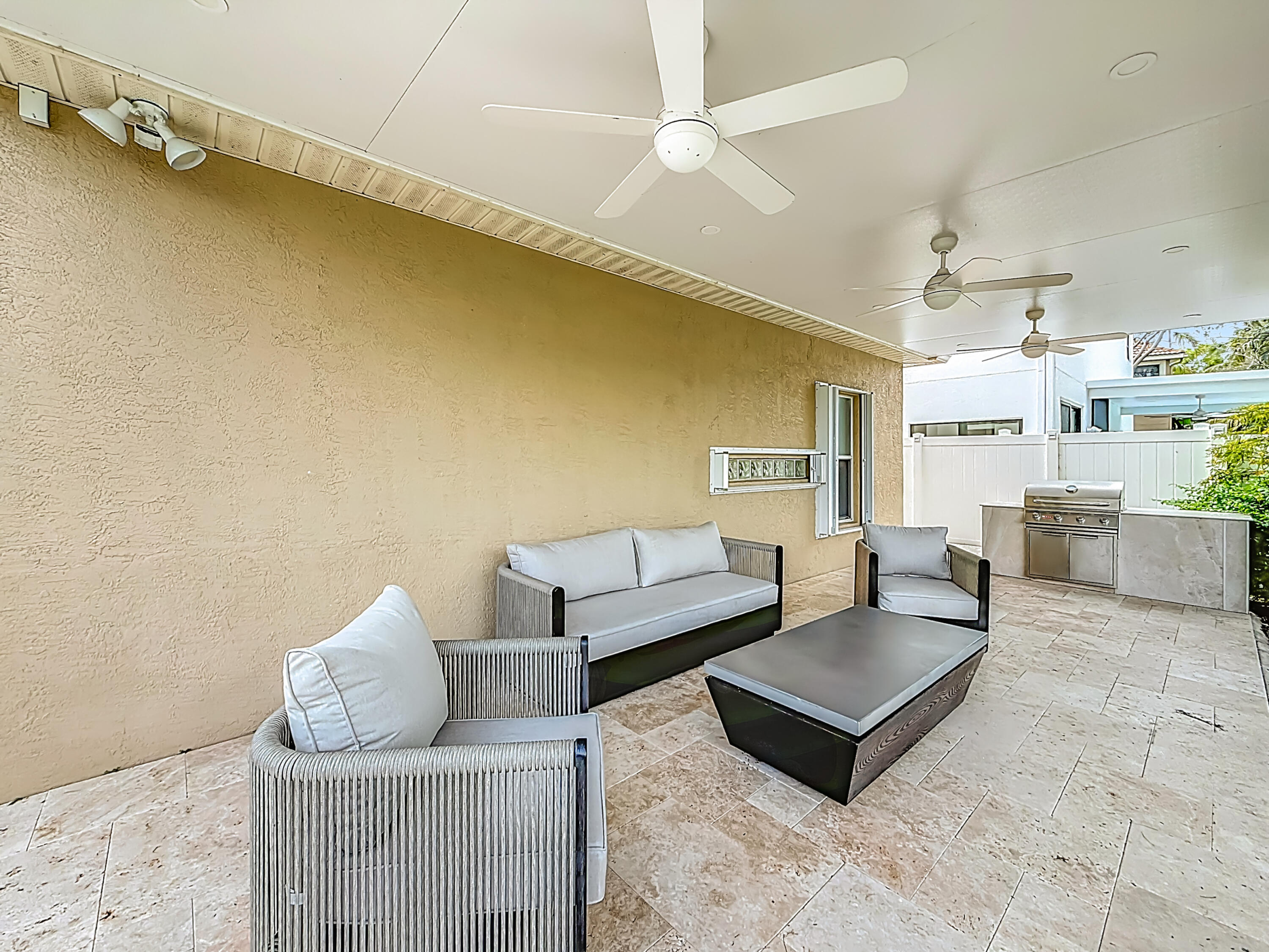 1143 Canoe Point Delray Beach, FL 33444 - Photo 53 of 85 a living room with furniture and a rug