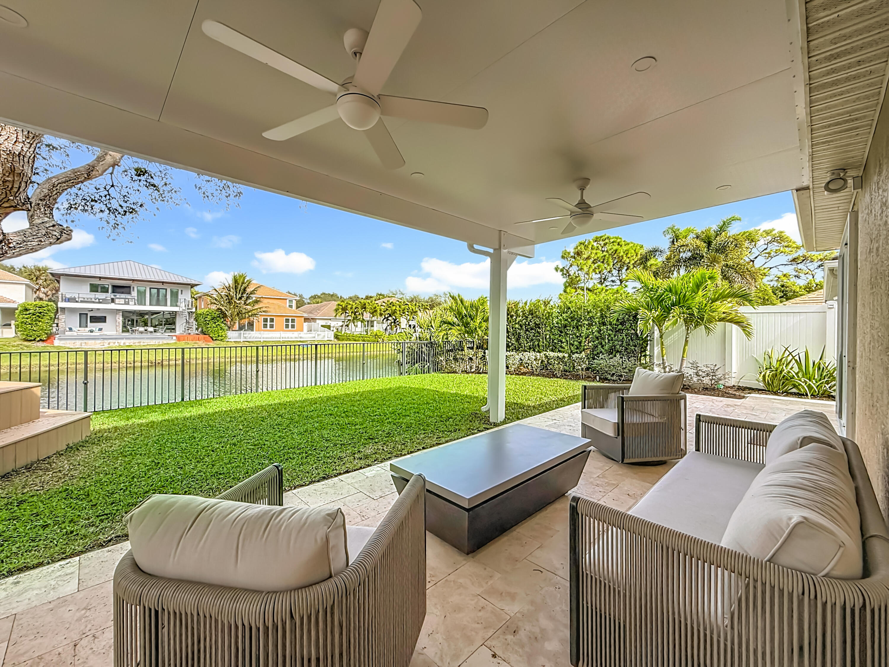 1143 Canoe Point Delray Beach, FL 33444 - Photo 55 of 85 a view of a patio with couches table and chairs