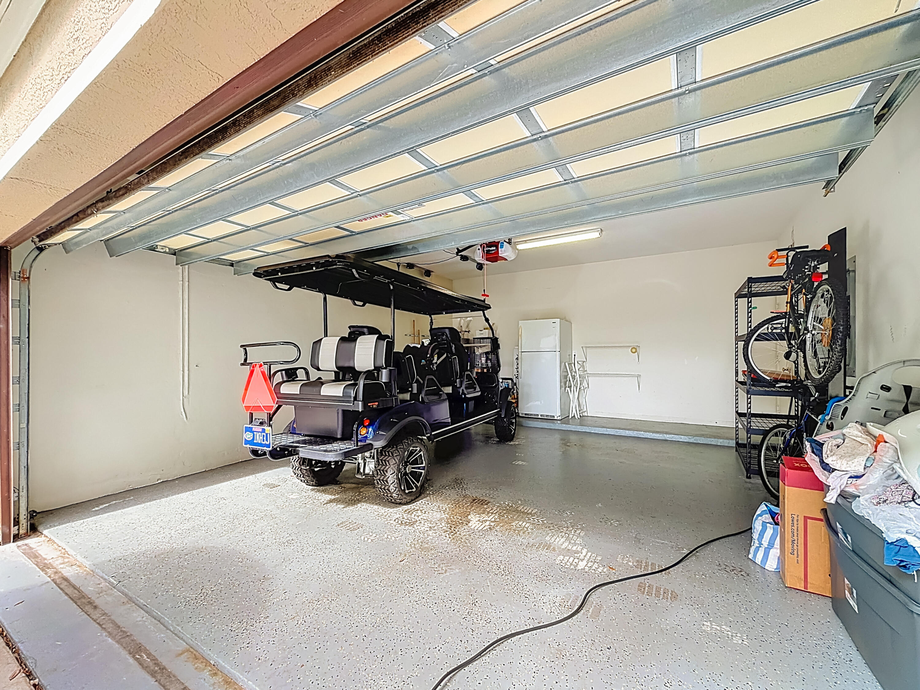 1143 Canoe Point Delray Beach, FL 33444 - Photo 62 of 85 a view of a storage room with a lot of stuff
