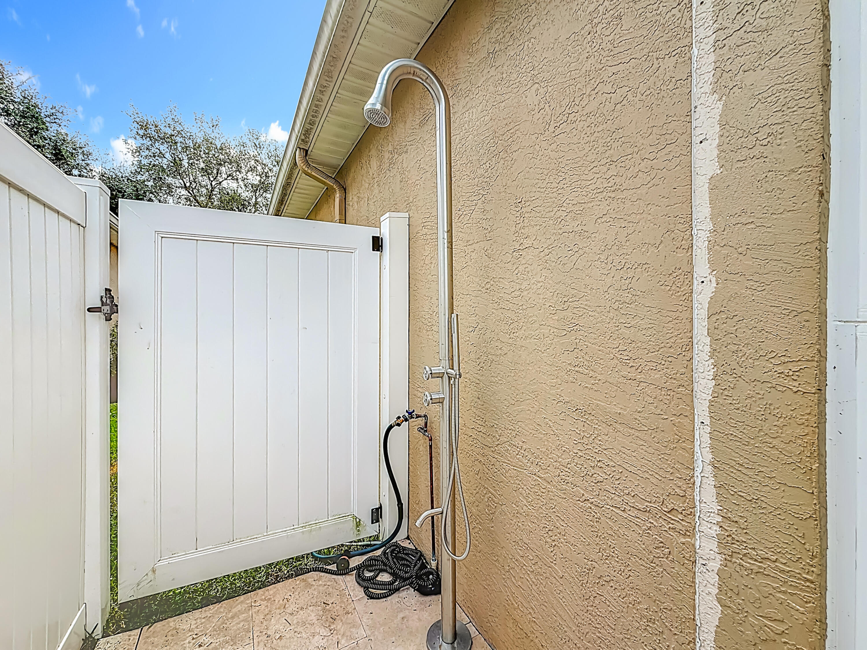 1143 Canoe Point Delray Beach, FL 33444 - Photo 69 of 85 a bathroom with a sink and a mirror