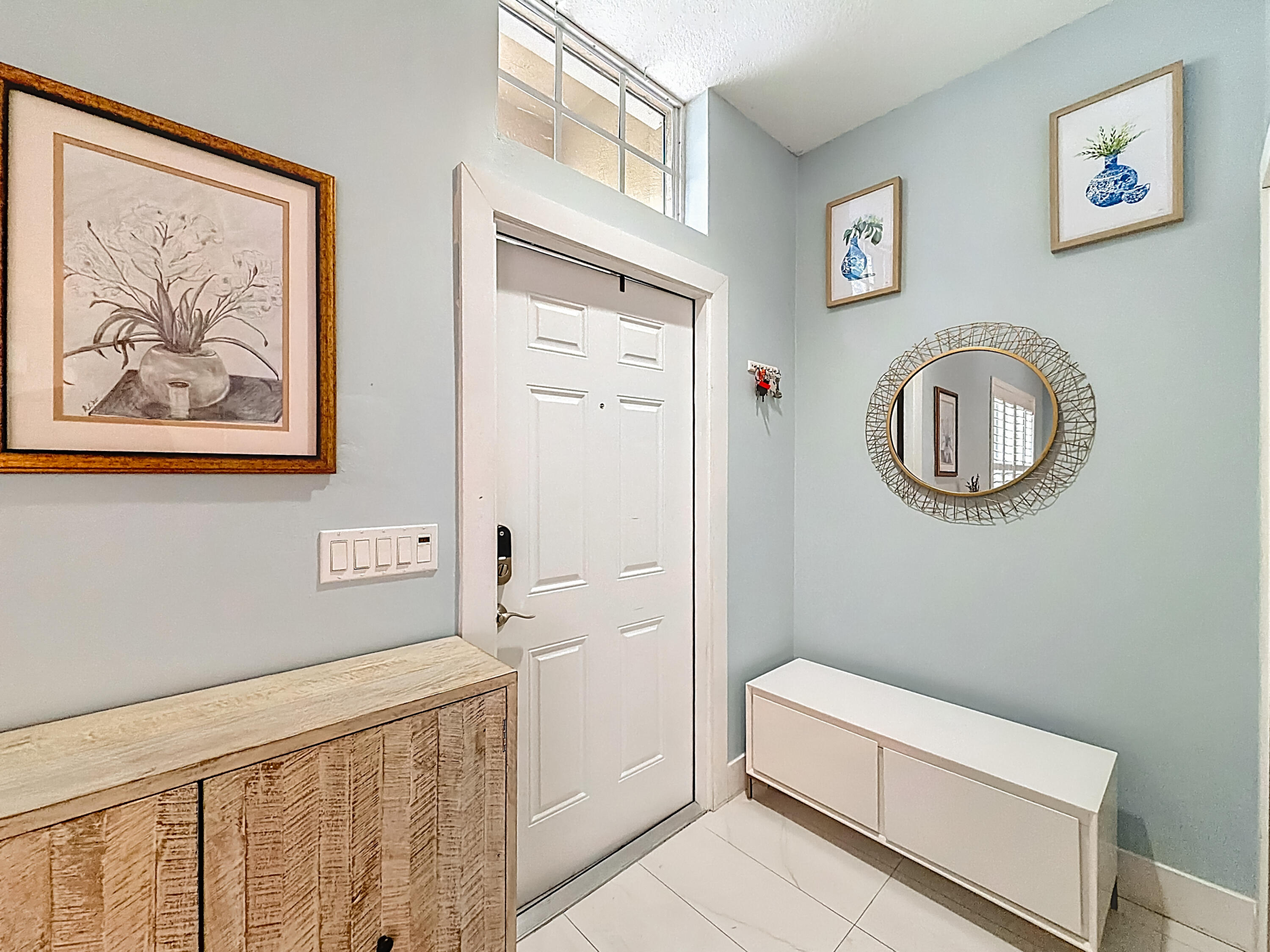 1143 Canoe Point Delray Beach, FL 33444 - Photo 7 of 85 a bathroom with a toilet a sink and a mirror
