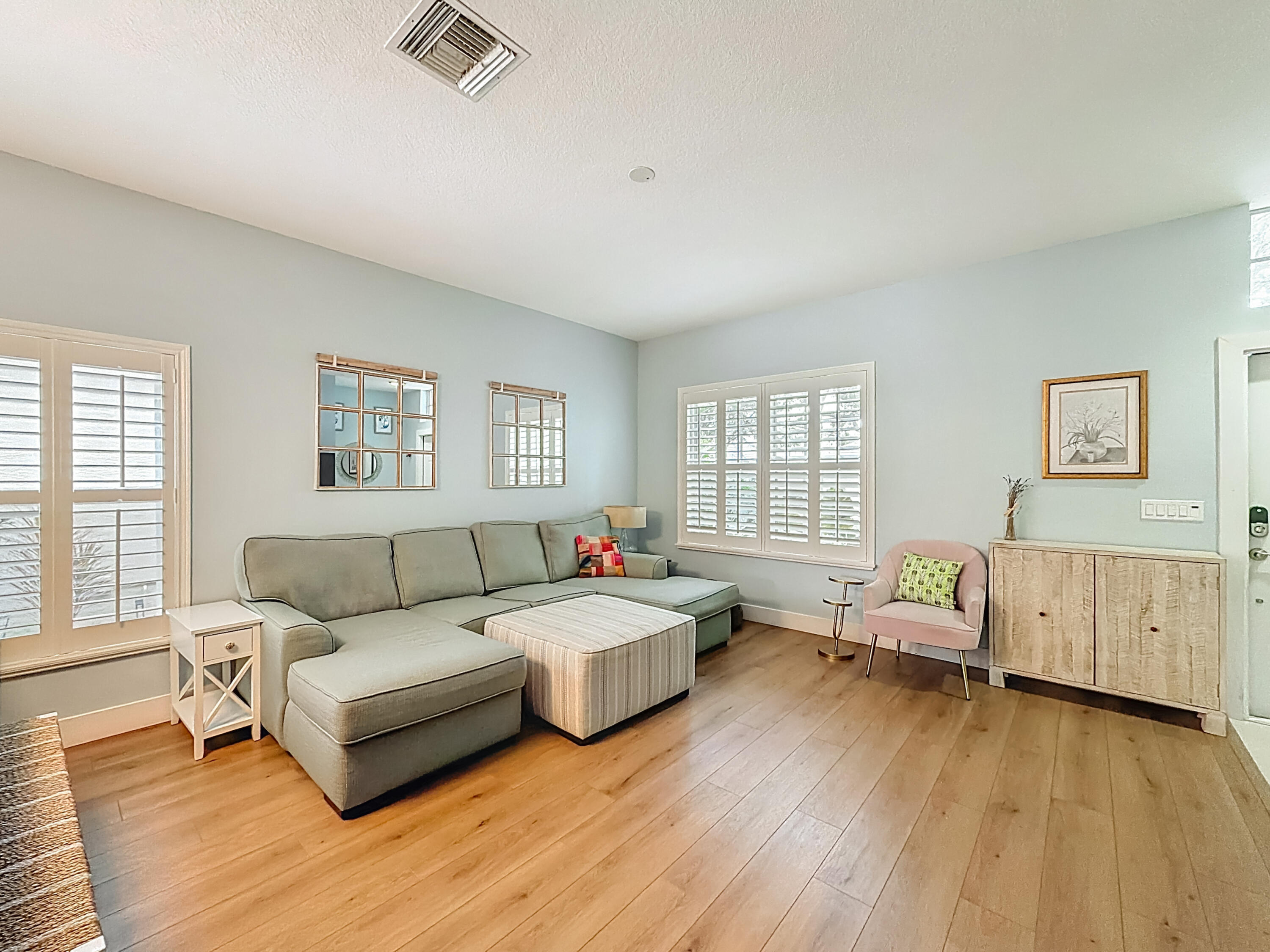 1143 Canoe Point Delray Beach, FL 33444 - Photo 9 of 85 a living room with furniture and a window