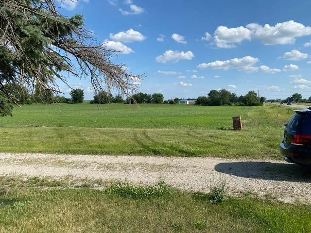 a view of a golf course with a lake