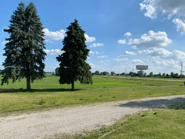 a view of a golf course with a lake