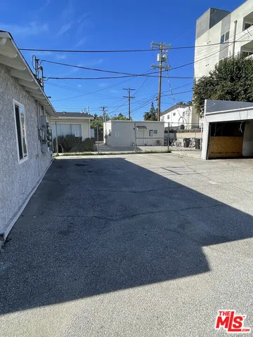 a view of street from balcony