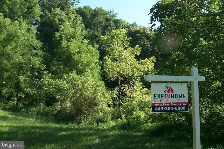 19601 Gunpowder Road Manchester, MD 21102 - Photo 1 of 1 a view of a sign in a garden