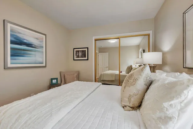 an aerial view of residential houses with yard