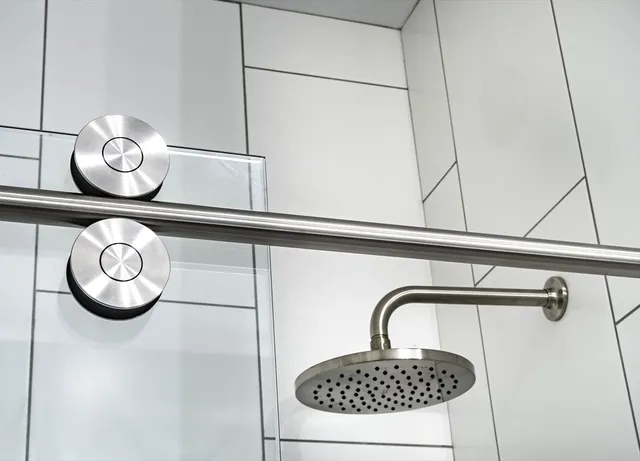 a close view of a stove top oven and cabinets