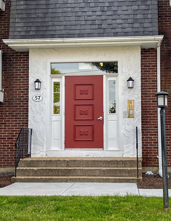 57 Will Drive, Unit 168 Canton, MA 02021 - Photo 1 of 15 a view of front door of house with stairs