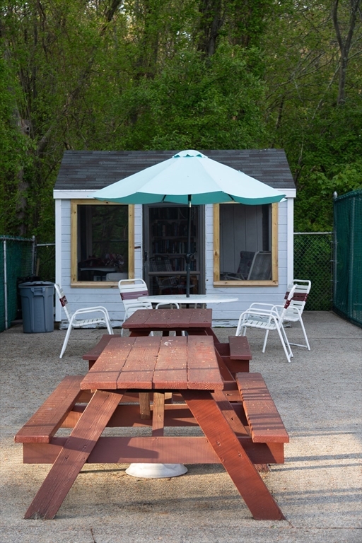 57 Will Drive, Unit 168 Canton, MA 02021 - Photo 15 of 15 a front view of a house with patio