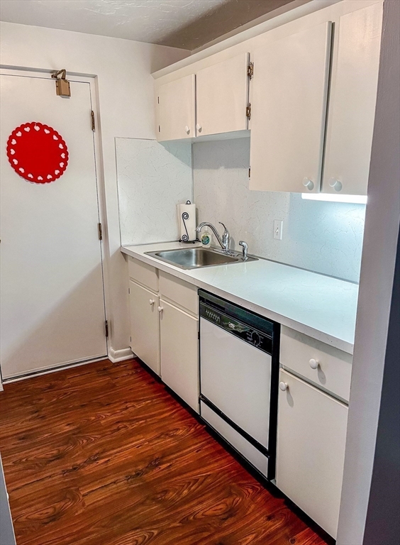 57 Will Drive, Unit 168 Canton, MA 02021 - Photo 6 of 15 a kitchen with a sink and cabinets