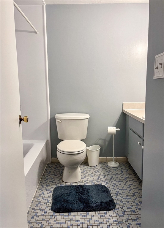 57 Will Drive, Unit 168 Canton, MA 02021 - Photo 10 of 15 a bathroom with a toilet a sink and bathtub
