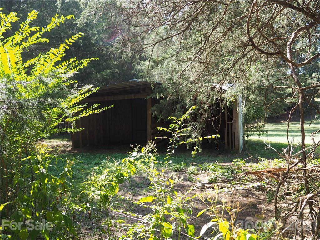 1201 Goldmine Road Chester, SC 29706 - Photo 29 of 30 a backyard of a house with lots of green space