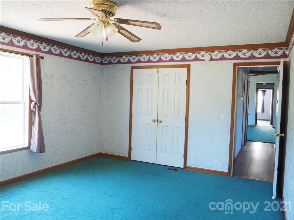 1201 Goldmine Road Chester, SC 29706 - Photo 10 of 30 a view of a room with a chandelier