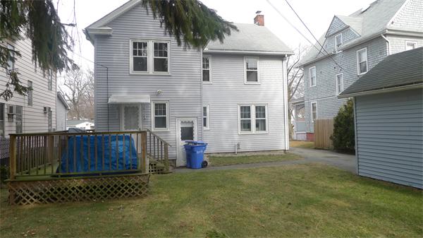 929 Sumner Avenue Springfield, MA 01118 - Photo 3 of 29 a view of a house with a yard