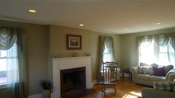 929 Sumner Avenue Springfield, MA 01118 - Photo 6 of 29 a living room with furniture and a fireplace