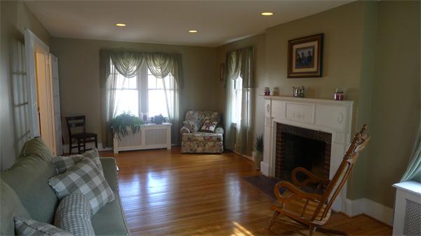 929 Sumner Avenue Springfield, MA 01118 - Photo 10 of 29 a view of a livingroom with furniture and a fireplace
