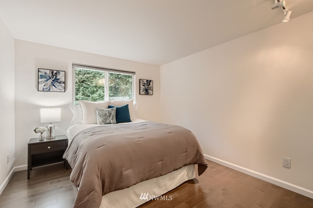 3301 198th Place Southeast Bothell, WA 98012 - Photo 16 of 35 a bedroom with a bed and a window
