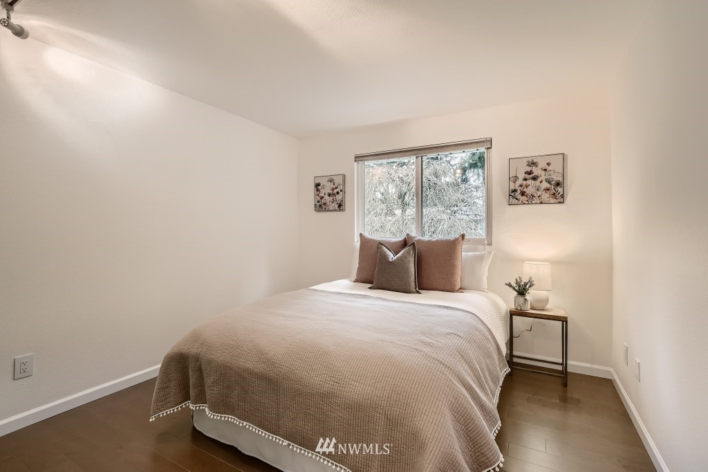 3301 198th Place Southeast Bothell, WA 98012 - Photo 18 of 35 a bedroom with a bed and a window