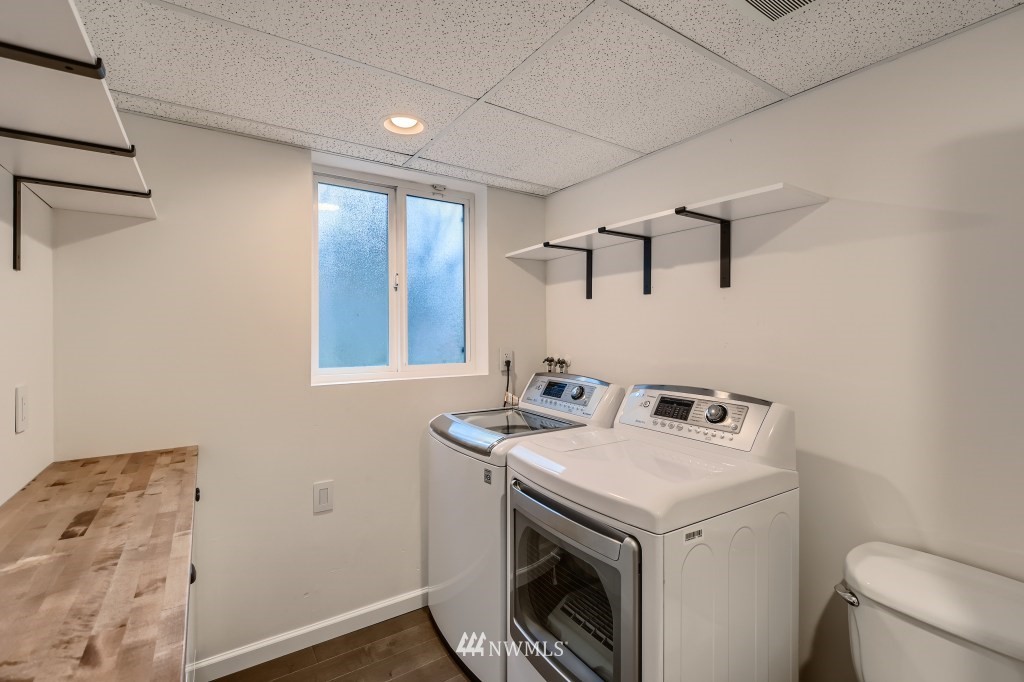 3301 198th Place Southeast Bothell, WA 98012 - Photo 25 of 35 a utility room with dryer and washer