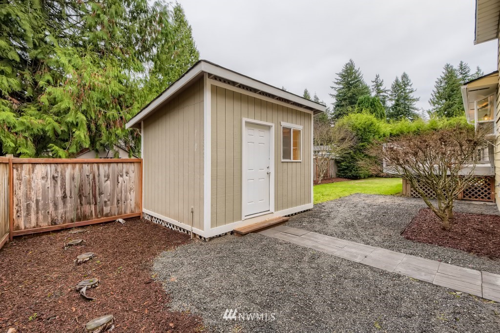3301 198th Place Southeast Bothell, WA 98012 - Photo 26 of 35 a view of backyard with plants and garden