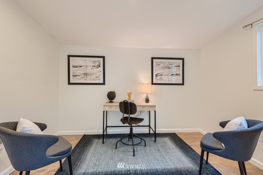 3301 198th Place Southeast Bothell, WA 98012 - Photo 28 of 35 a living room with furniture and a rug