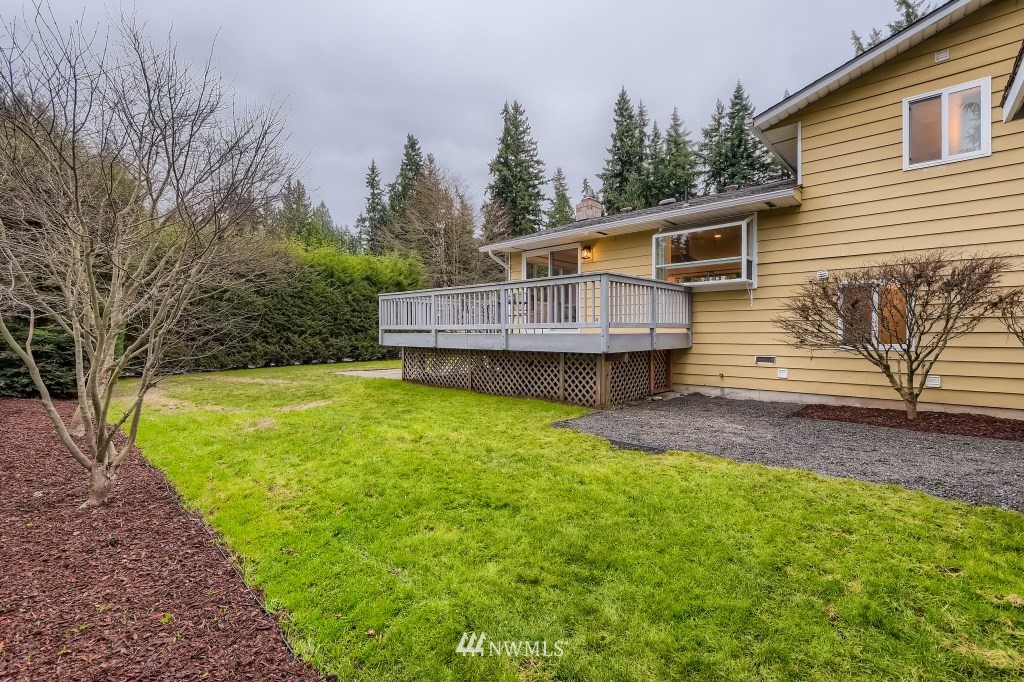 3301 198th Place Southeast Bothell, WA 98012 - Photo 32 of 35 a view of a house with a backyard