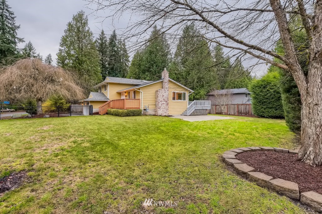 3301 198th Place Southeast Bothell, WA 98012 - Photo 34 of 35 a front view of house with yard and green space