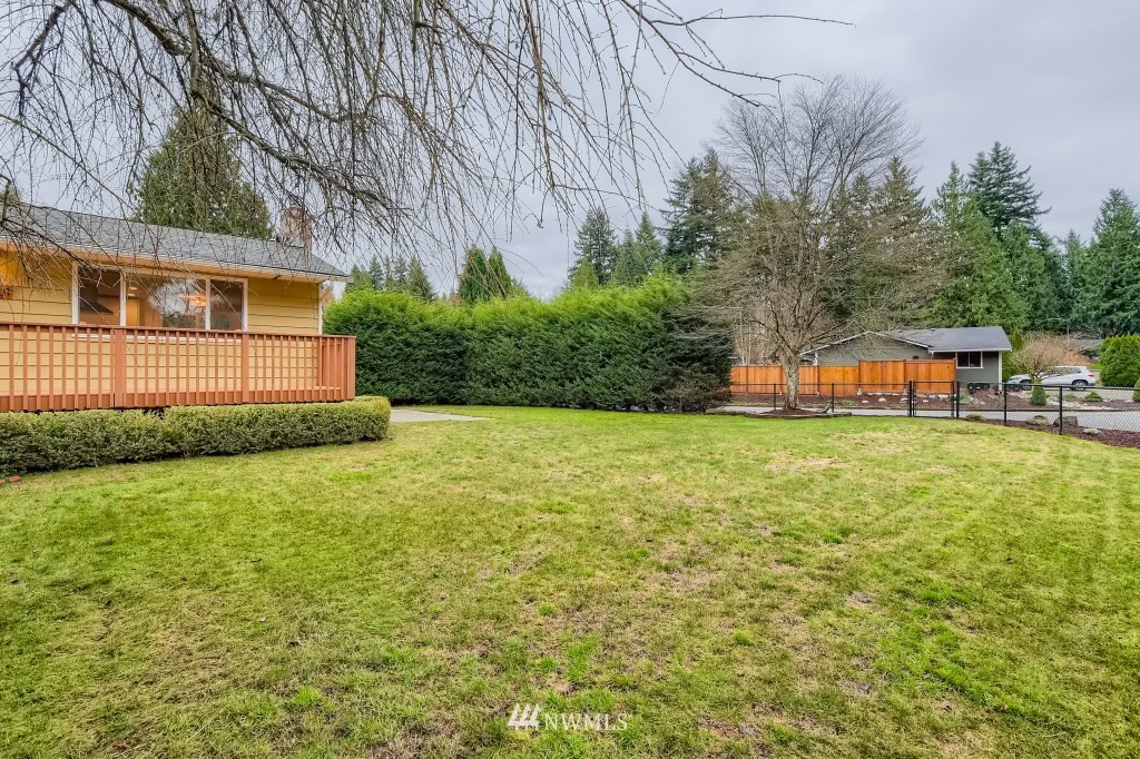 3301 198th Place Southeast Bothell, WA 98012 - Photo 35 of 35 a front view of a house with a yard