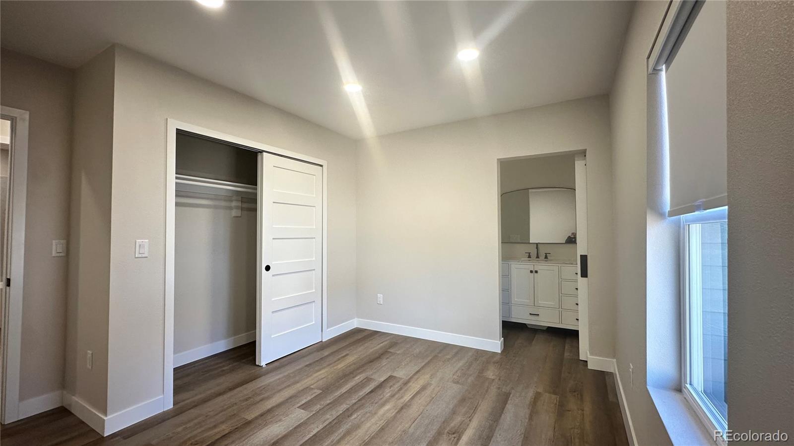 215 6th Street Hugo, CO 80821 - Photo 20 of 28 wooden floor in an empty room
