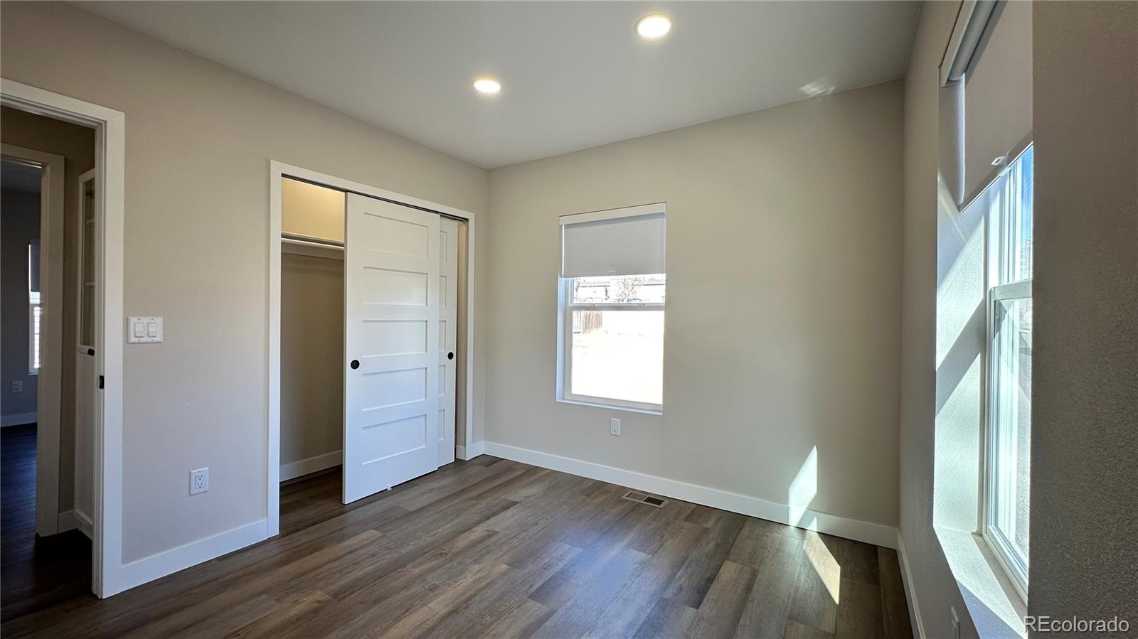 215 6th Street Hugo, CO 80821 - Photo 28 of 28 a view of empty room with window and wooden floor