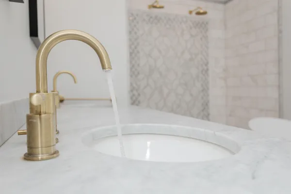 a close view of a bathtub in a bathroom