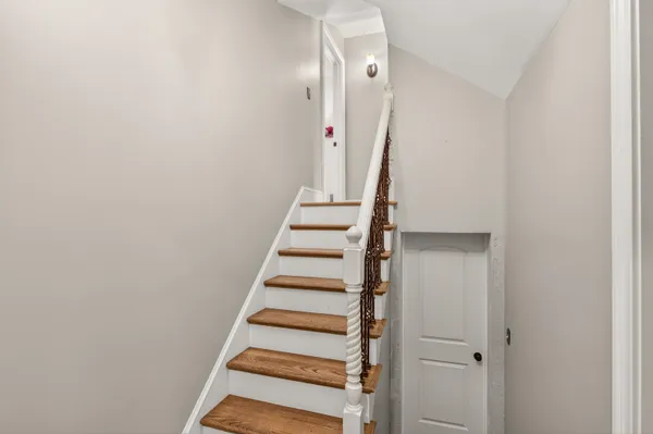 a view of entryway with wooden floor