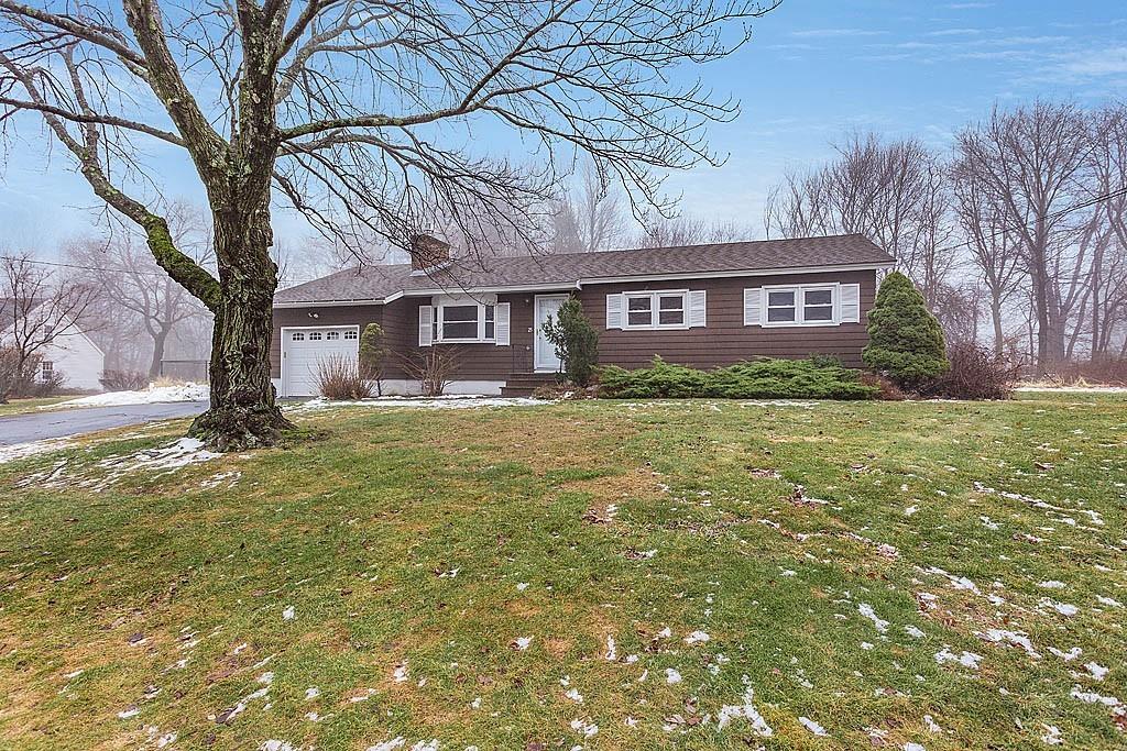 25 Garland Road Chelmsford, MA 01824 - Photo 1 of 25 a view of a yard in front of a house
