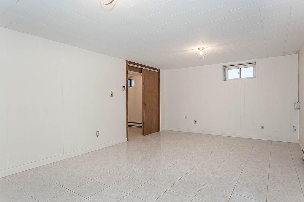 25 Garland Road Chelmsford, MA 01824 - Photo 17 of 25 an empty room with an entryway