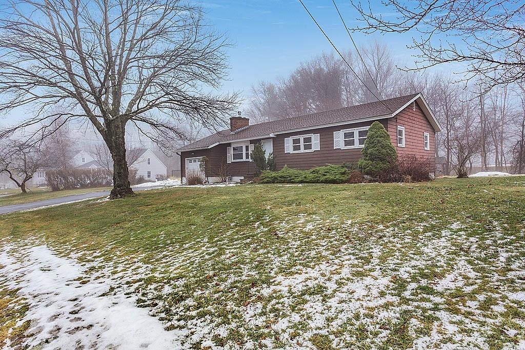 25 Garland Road Chelmsford, MA 01824 - Photo 24 of 25 a brick house that has a tree in front of it