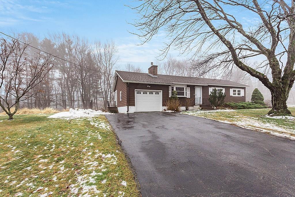 25 Garland Road Chelmsford, MA 01824 - Photo 25 of 25 a view of a house with a yard and tree s