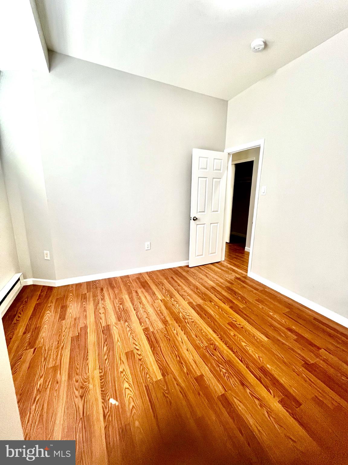 7106 Devon Street, Unit 1 Philadelphia, PA 19119 - Photo 4 of 11 Bright, airy space with warm wood floors.