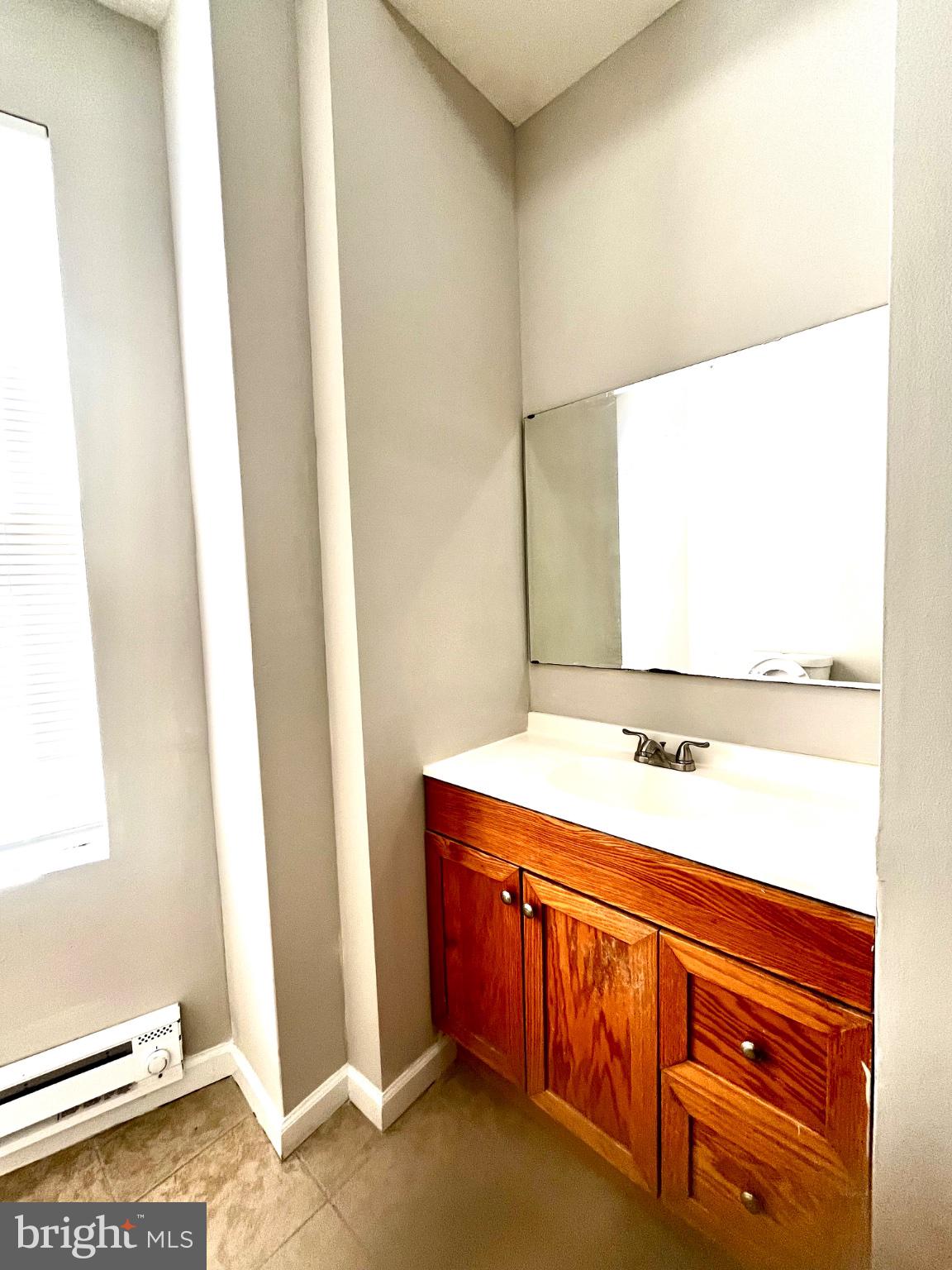 7106 Devon Street, Unit 1 Philadelphia, PA 19119 - Photo 7 of 11 Bright and inviting bathroom space.