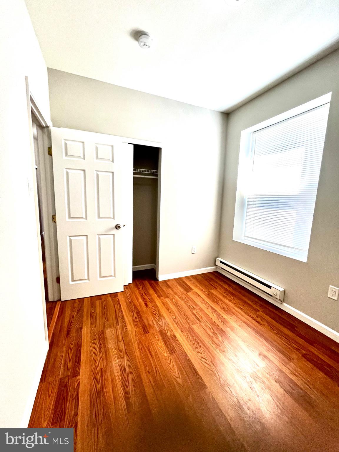 7106 Devon Street, Unit 1 Philadelphia, PA 19119 - Photo 8 of 11 Bright and airy room with warm tones.