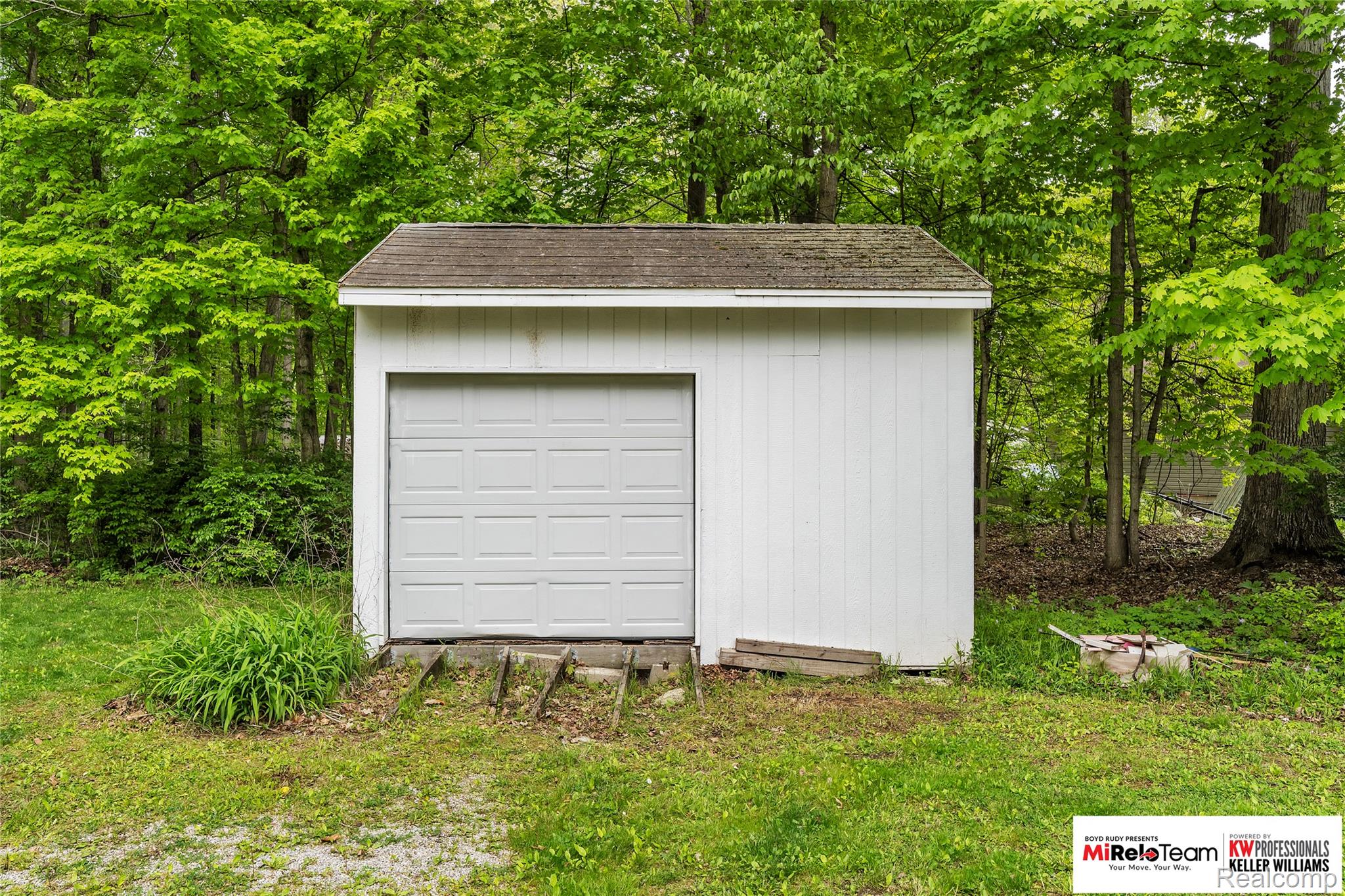10191 Judd Road Willis, MI 48191 - Photo 25 of 39 View of shed featuring view of scattered trees