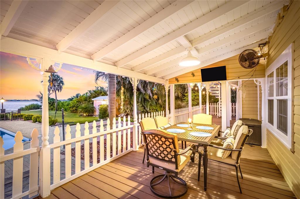 19007 Scallop Loop, Unit 204 Lakewood Ranch, FL 34211 - Photo 51 of 57 a view of a patio with table and chairs