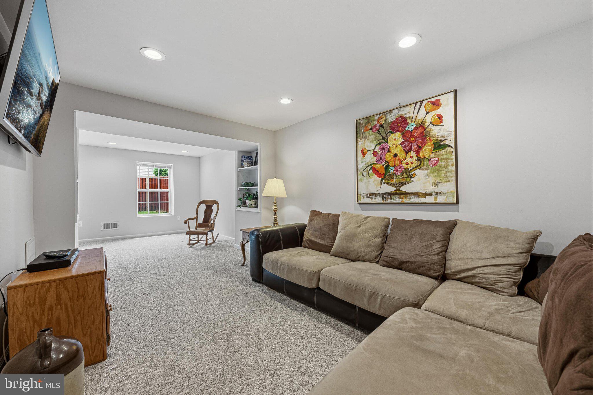 602 Shanks Evans Road Northeast Leesburg, VA 20176 - Photo 33 of 43 Inviting space with vibrant artwork.