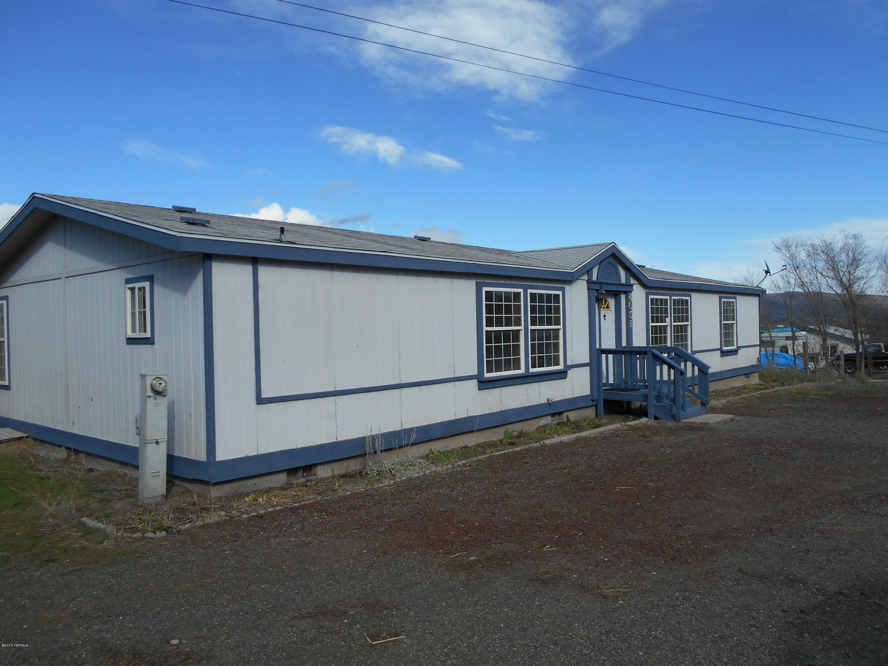 4051 Wenas Road South Selah, WA 98942 - Photo 21 of 21 a front view of a house with a garage